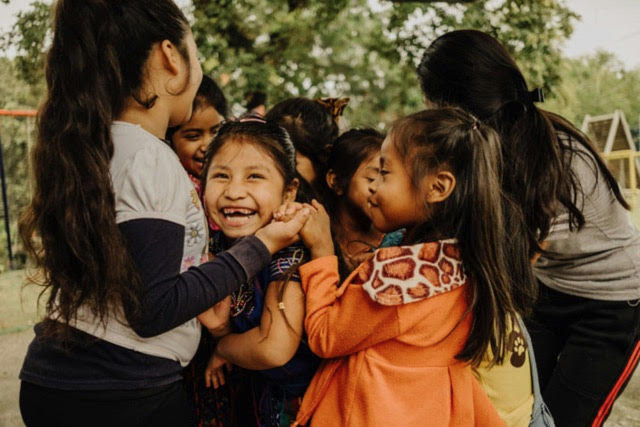 Guatemalan girls hugging