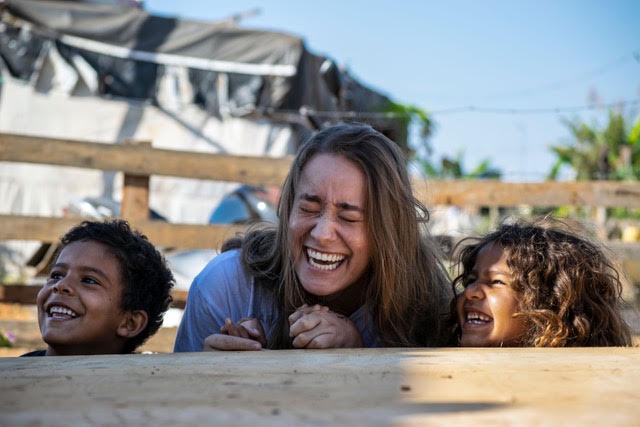 Laughing woman with 2 kids